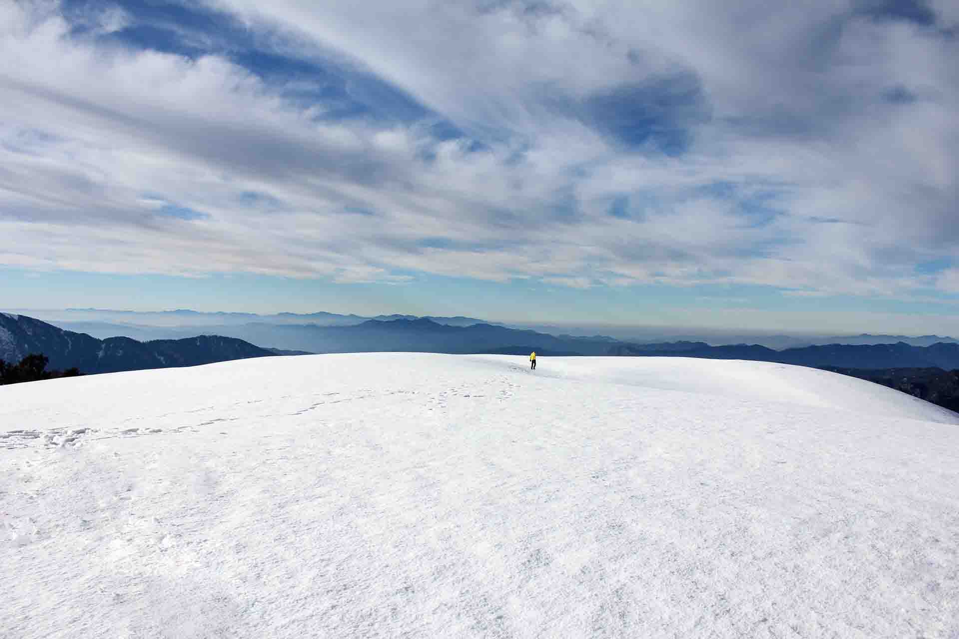 Long shot from the top of a snowy mountain