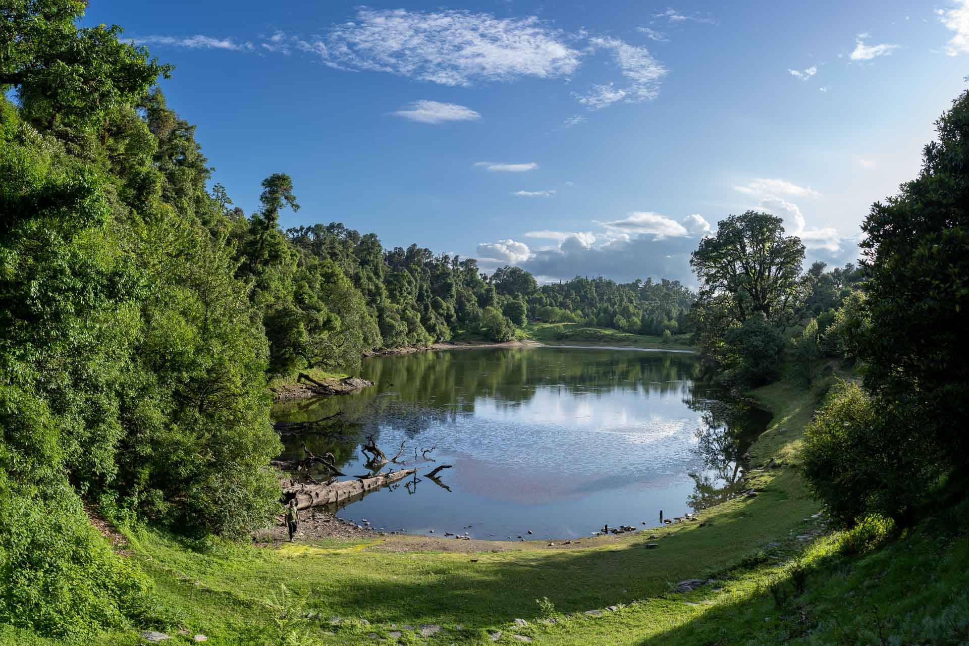 Teh Devariya Tal lake surrounded by trees